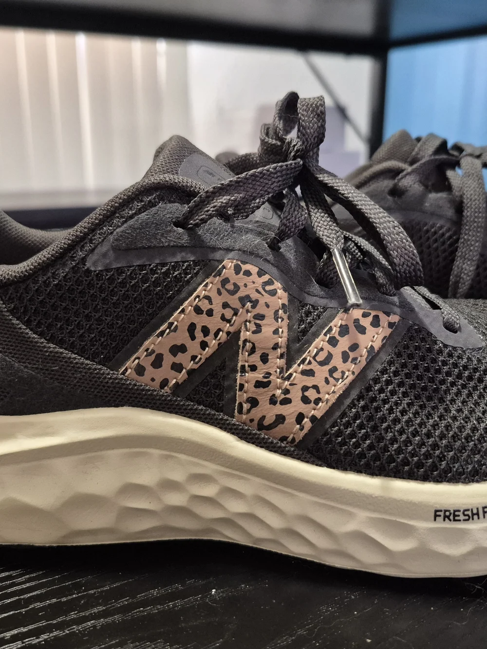 New Balance Women's Black Running Sneakers with Leopard Accent